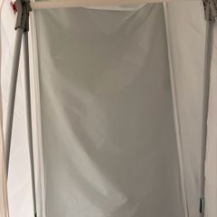 covered clothes hanging rail
