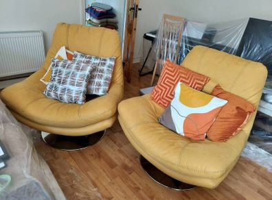 2 Yellow Swivel Armchairs