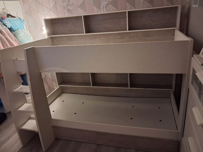 Bunk beds with integrated shelving