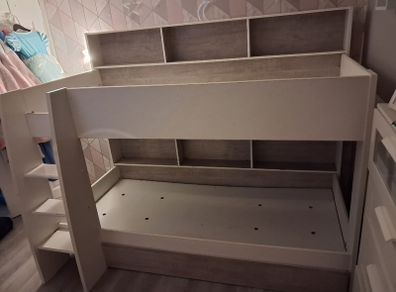 Bunk beds with integrated shelving