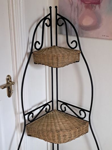 Wrought iron and wicker corner shelf unit