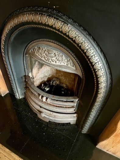 Cast Iron and timber fireplace