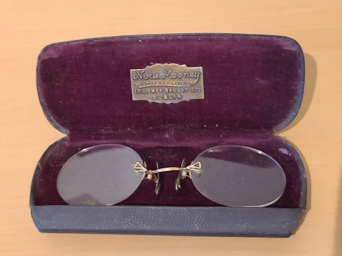 Very collectable vintage clip on glasses from Nora Mooney optician's