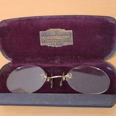 Very collectable vintage clip on glasses from Nora Mooney optician's