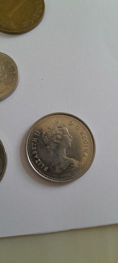 Coins a mix of different countries 28 coins in total registered post included