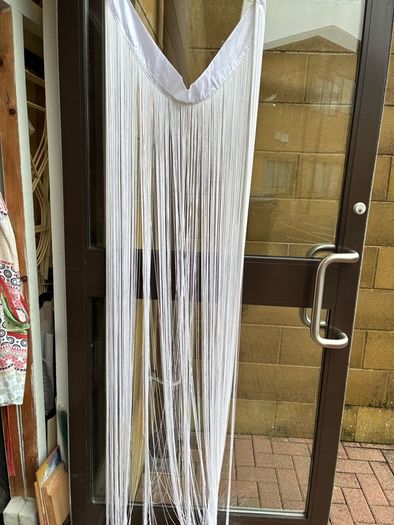 This is a white string curtain