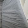 Twin bed, quite high, to store things underneath Image 3