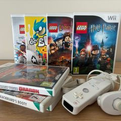 x7 Wii games, incl. de Blob and LEGO games, plus Wii remote and Nunchuk
