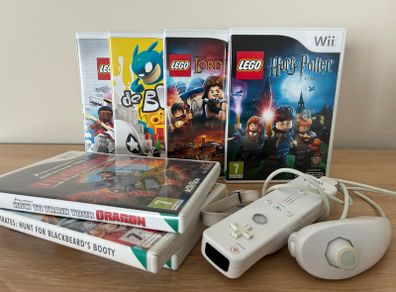 x7 Wii games, incl. de Blob and LEGO games, plus Wii remote and Nunchuk