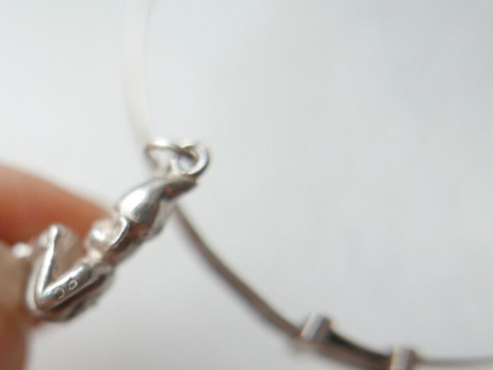 Vintage 925 Sterling Silver bangle with charm