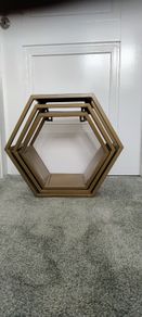 Gold coloured display shelves, set of 3
