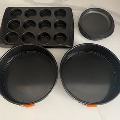 Pyrex, Wilton & Le Creuset tins