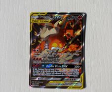 Reshiram & Charizard SM201 tag team pokemon card