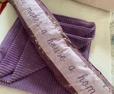 Draught excluder and 4 cushion covers