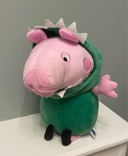 Peppa Pig in dinosaur costume