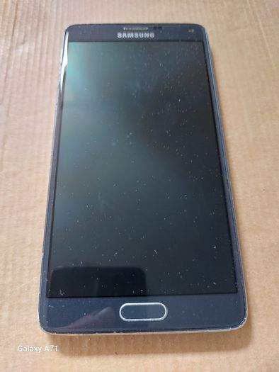 Samsung Galaxy Note 4, Model SM-N910F, in excellent cosmetic condition, not powering on, Battery looks a little swollen, so may need new battery