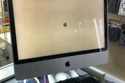 iMac 21 with keyboard and mouse.