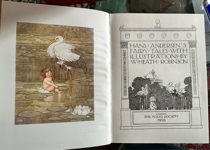 Delve into the enchanting world of Hans Christian Andersen with "Hans Anderson's Fairy Tales" presented by The Folio Society in 2001. This hardcover edition, graced with the whimsical illustrations of W. Heath Robinson, offers a timeless collection that t