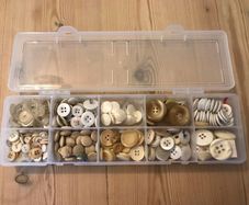 Box of white/off- white/grey assorted buttons: