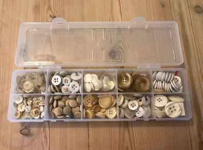 Box of white/off- white/grey assorted buttons: