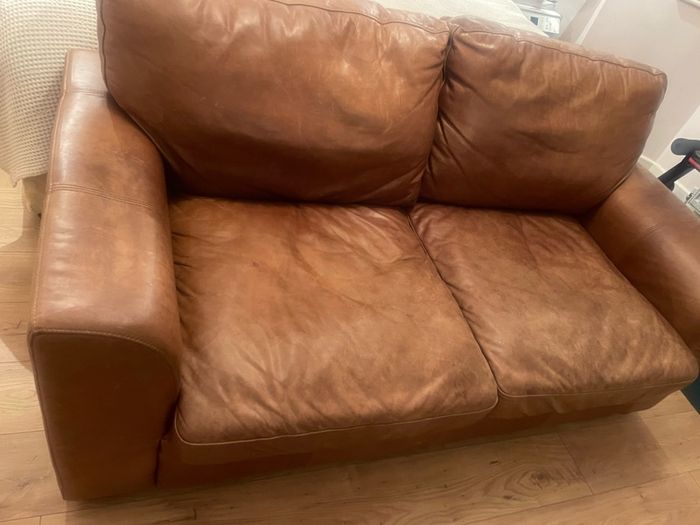 brown leather couches x 2 - will sell separately 650 each