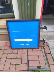 Double sided iron sign