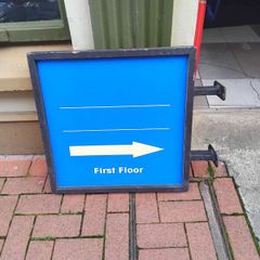 Double sided iron sign