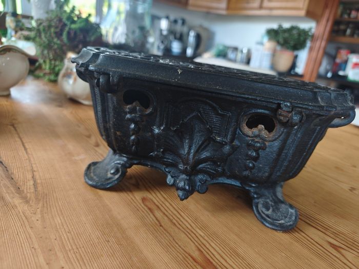 Antique  cast iron warmer