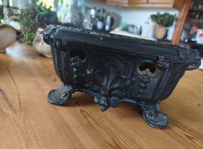 Antique  cast iron warmer