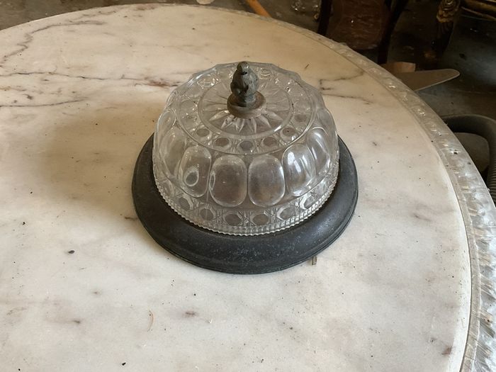 Old brass mounted glass ceiling light in a low profile