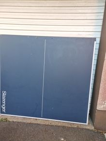 full size Slazenger table tennis table comes in 2 detachable panels for easy storage with supoort legs and clamps for positioning onto amy size table. Net required to purchase separately but are inexpensive.