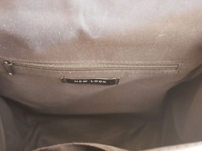Ladies black synthetic bag.