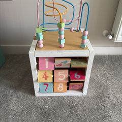 wooden activity cube