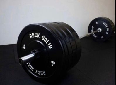 Olympic Barbell + weight plates (127.5kg total)