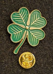 Shamrock , pin back badge.