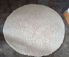 round cream rug