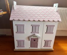 Wooden dolls house with accessories