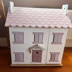 Wooden dolls house with accessories