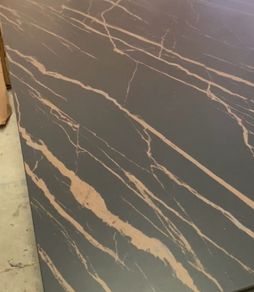 Black and brown extendable dining table