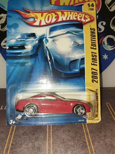 Hot Wheels Ferrari die-cast model cars from the mid-2000s and late 1990s card collections.