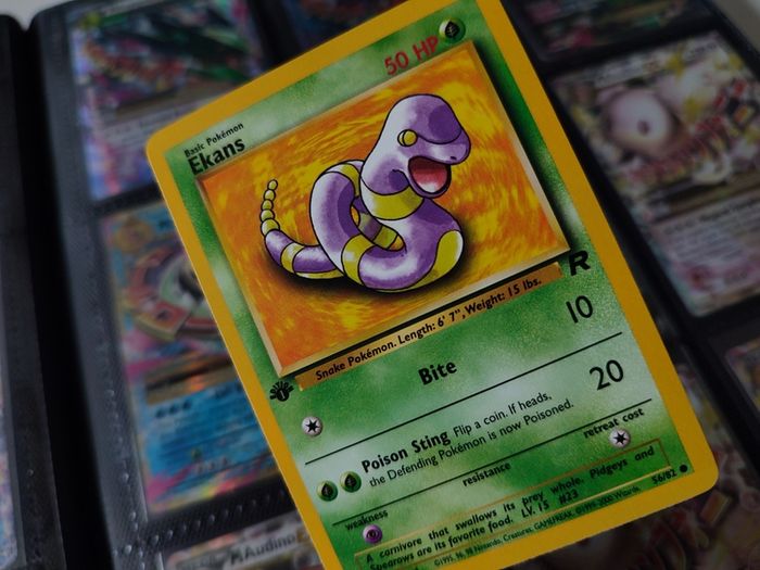 Ekans ! FIRST EDITION ! Rare Near Mint- Mint Condition ! from Team Rocket Set ! 2000 ! Pokemon Card !