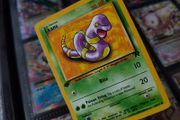 Ekans ! FIRST EDITION ! Rare Near Mint- Mint Condition ! from Team Rocket Set ! 2000 ! Pokemon Card !
