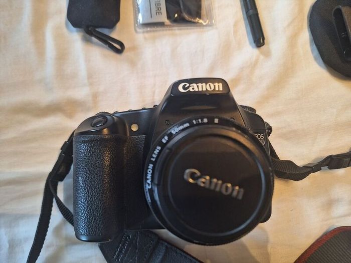 canon camera and pro lenses and a Pentax film system