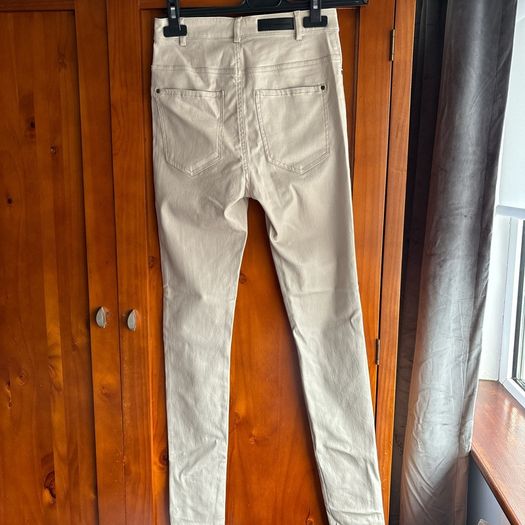 Cream pleather trousers