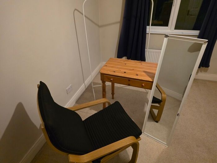 table , chair , mirror and cloths