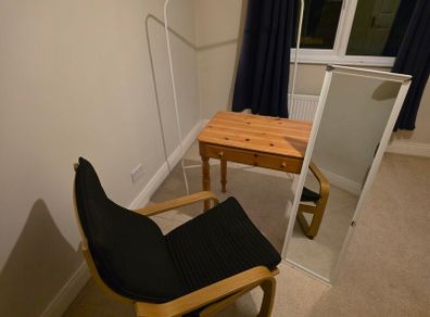 table , chair , mirror and cloths