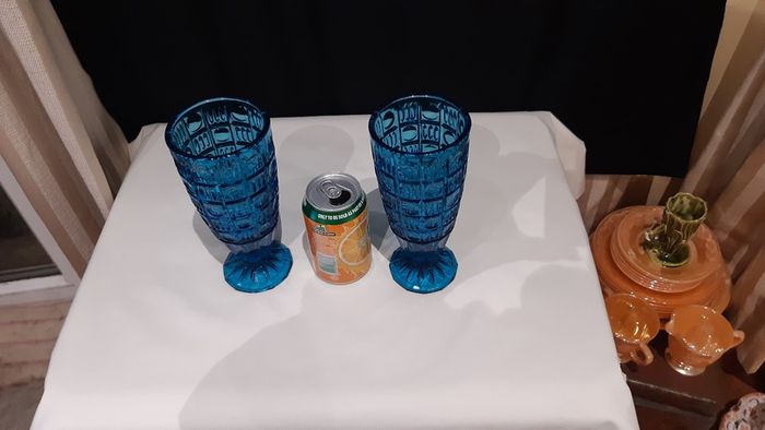 A pair of blue/deep turquoise glass vases
