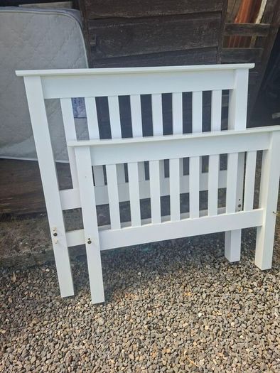 single wooden bed