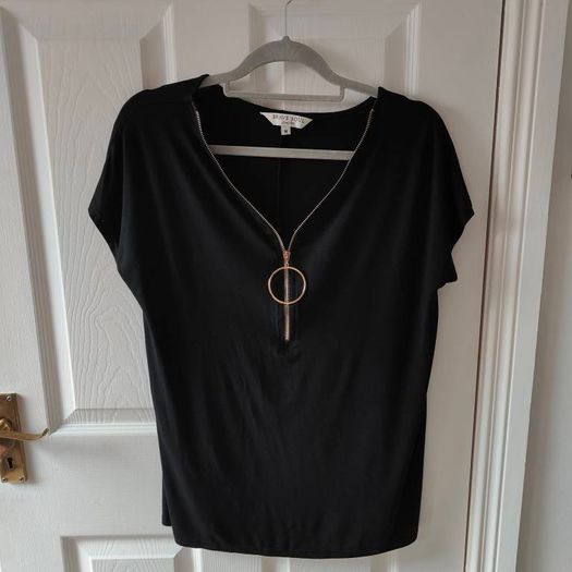 Black V Neck front zip top, size 12