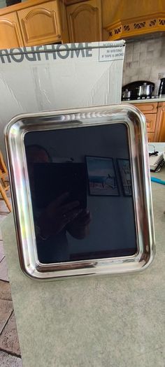 Frame marked BJF with a model number or code EPNS, 7 x 9.5 inhes